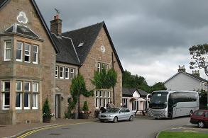 touring coach awaits in Inveraray